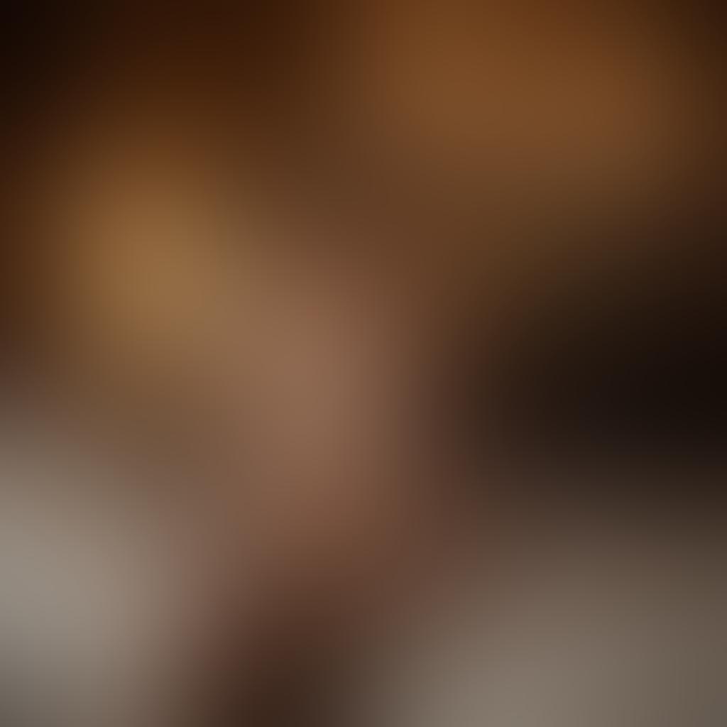 A sultry scene featuring a curvy, confident woman posing sensually in a dimly lit room adorned with plush fabrics and soft lighting. She wears elegant lingerie that accentuates her curves, with inviting expressions and playful gestures that capture the essence of self-assurance. Background elements include soft shadows and dimmed candlelight to evoke an intimate atmosphere, enhancing the allure of solo performances. super-realistic. soft lighting. intimate atmosphere.